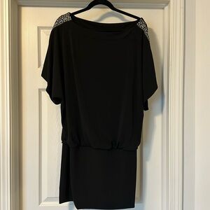 WHBM black dress, size medium. Sequin design on sleeves.